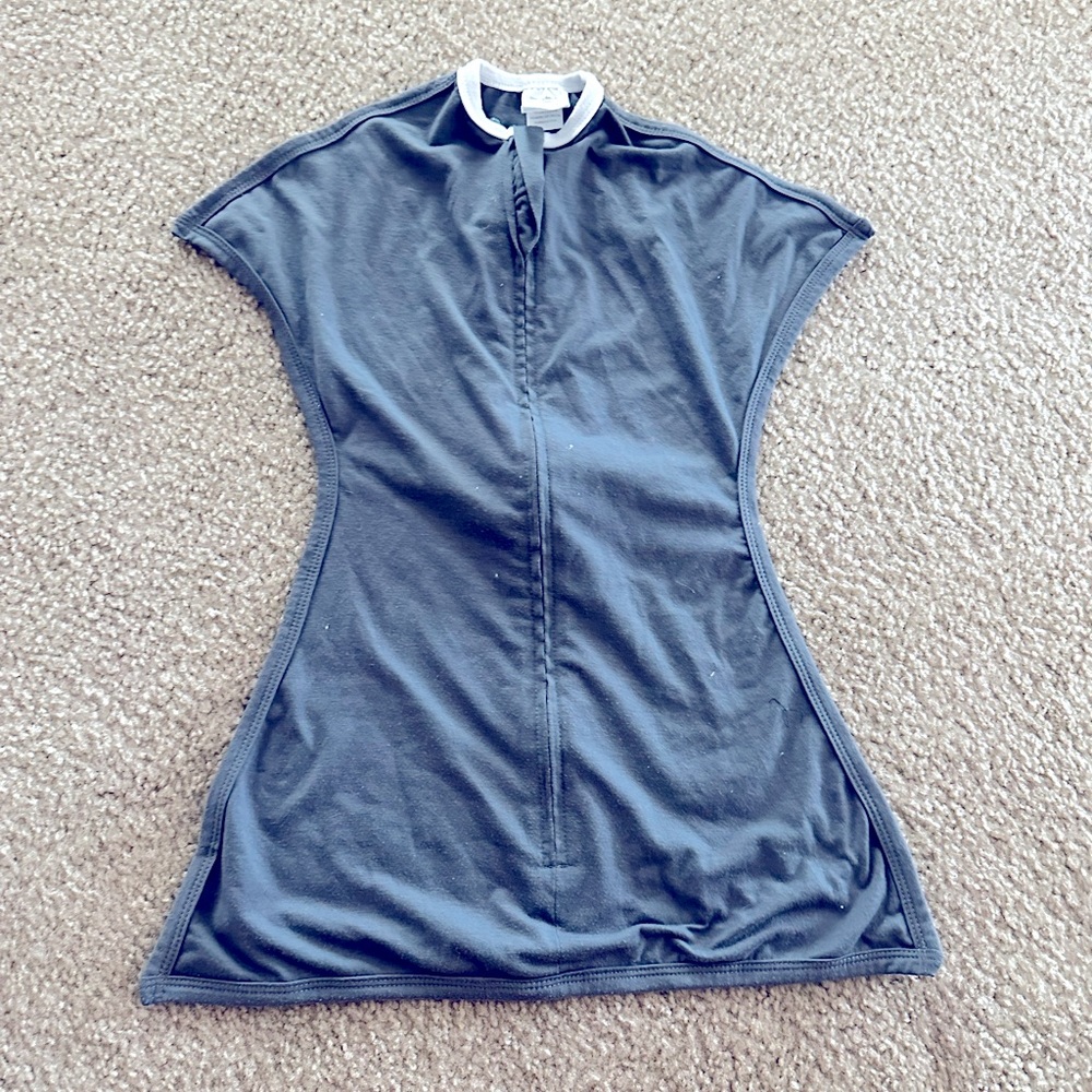 Sleeping Baby Zipadee - Zip transitional swaddle.
